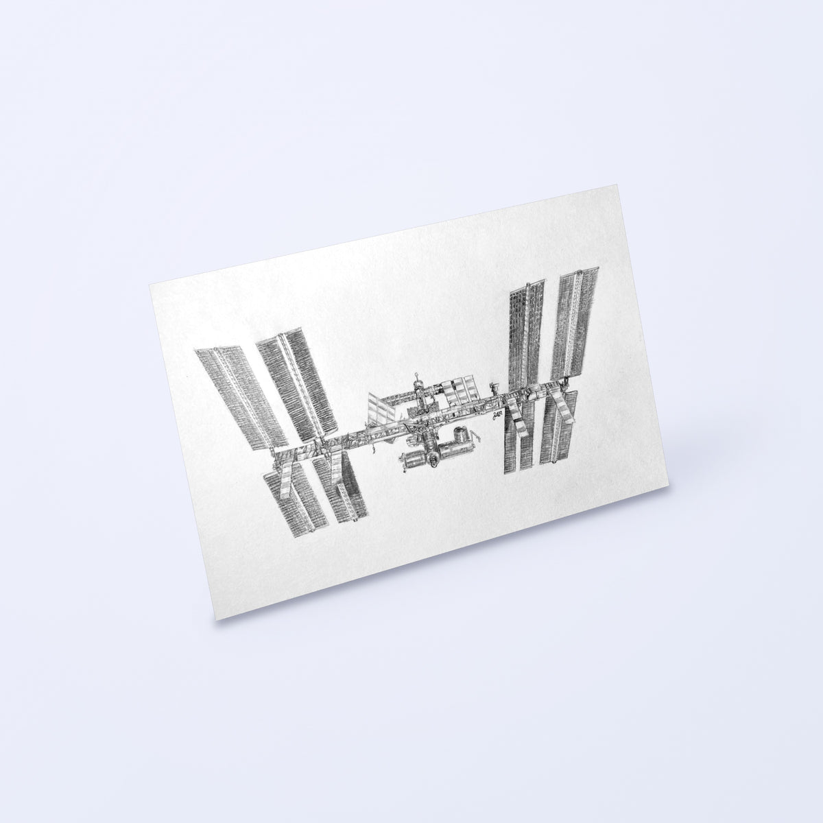 Pencil drawing of the International Space Station as a fine art print, shown at an angle on a light background
