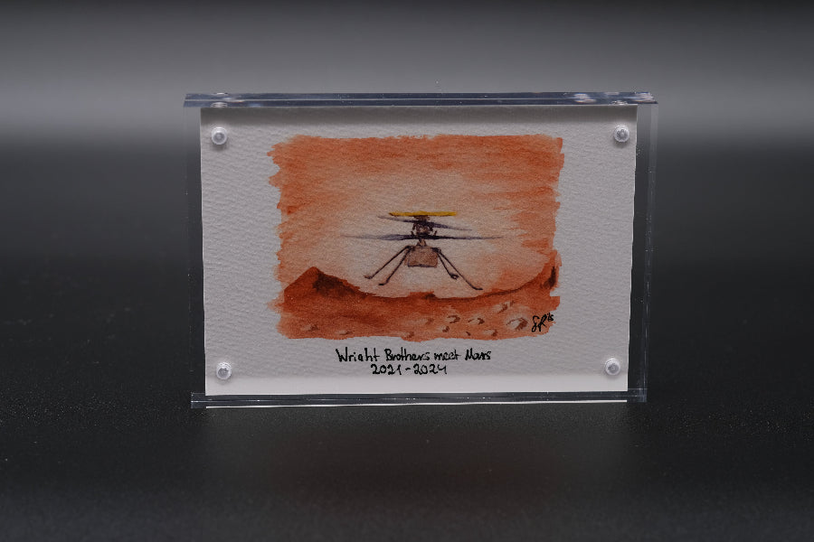 Acrylic block display with a watercolor painting of NASA’s Ingenuity Mars helicopter flying above the red Martian surface, titled “Wright Brothers meet Mars”