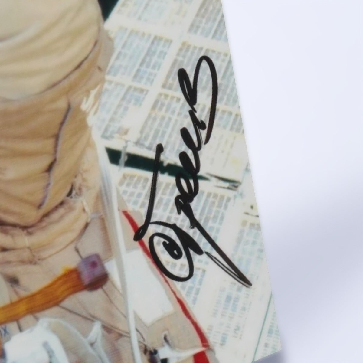 Close-up of Sergey Treshchov's signature on the photo