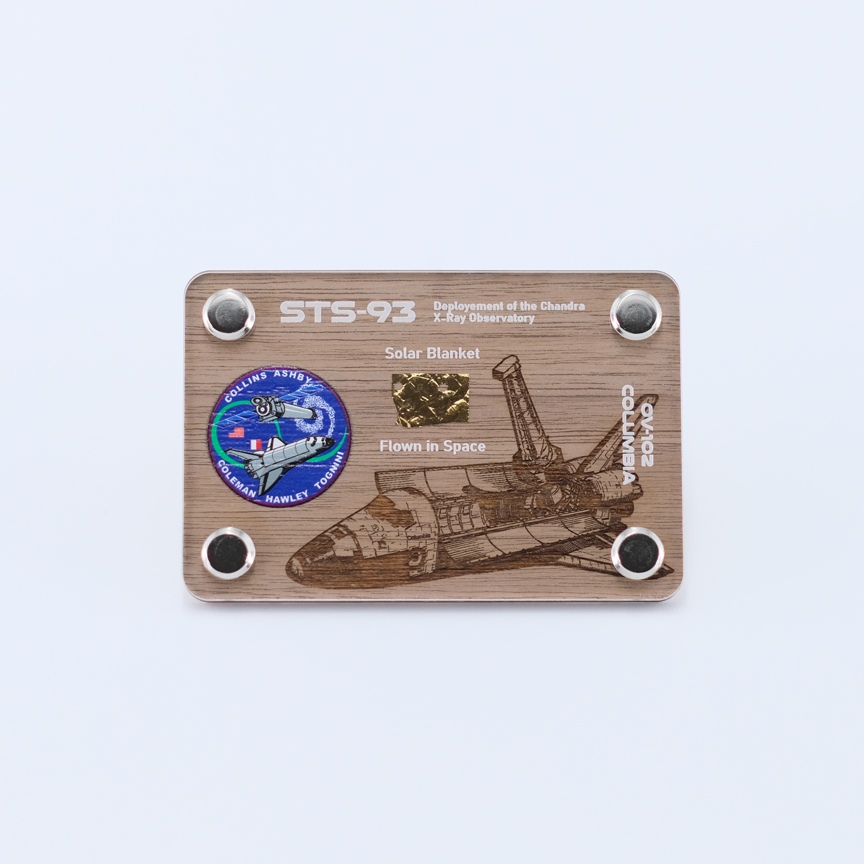 Authentic flown solar blanket artifact from Space Shuttle Columbia STS-93, the mission that deployed the Chandra X-ray Observatory, displayed in a handcrafted collectible card.