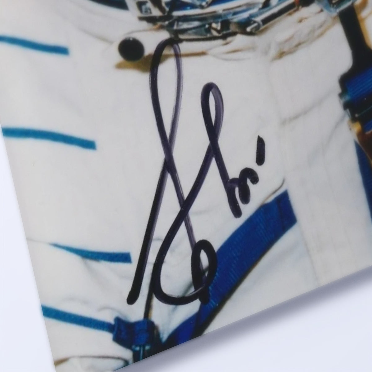 Close-up of Valery Bykovsky's signature on the photo