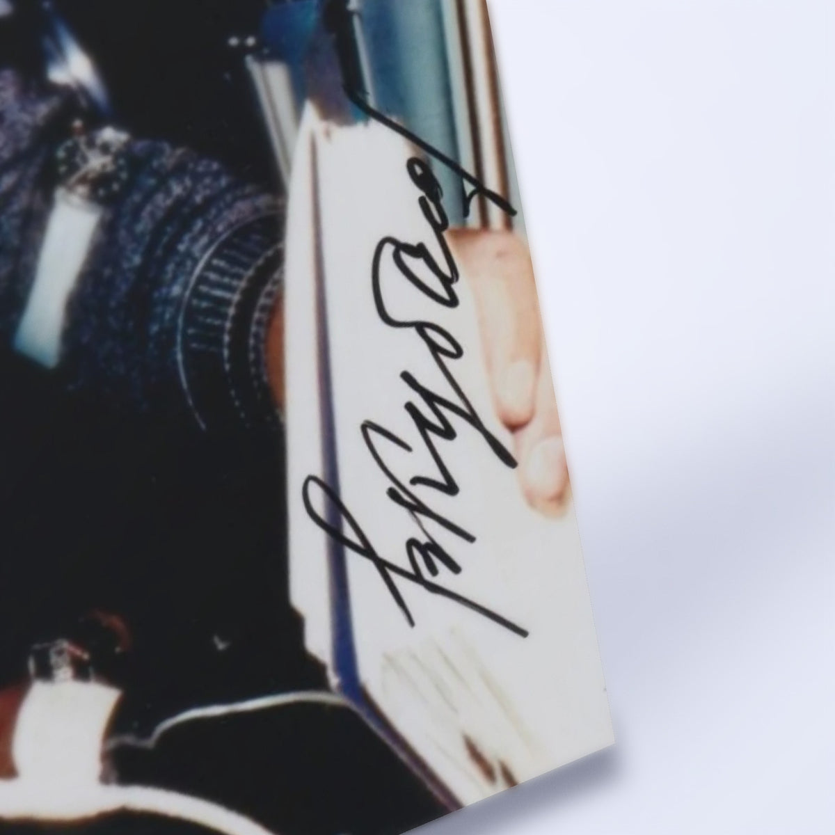 Close-up of Valery Kubasov's signature on the Apollo-Soyuz photo