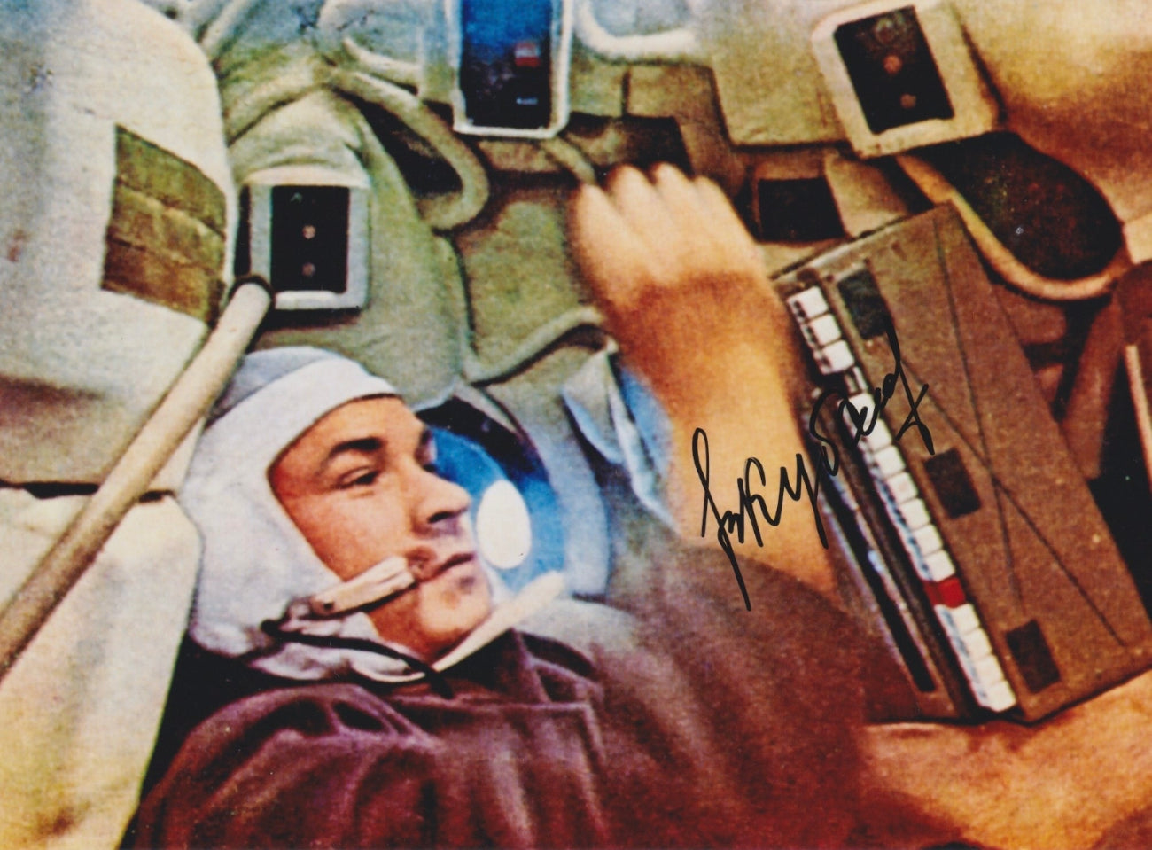 Signed portrait of cosmonaut Valery Kubasov in Sokol spacesuit with mission patch, perfect for space memorabilia collectors