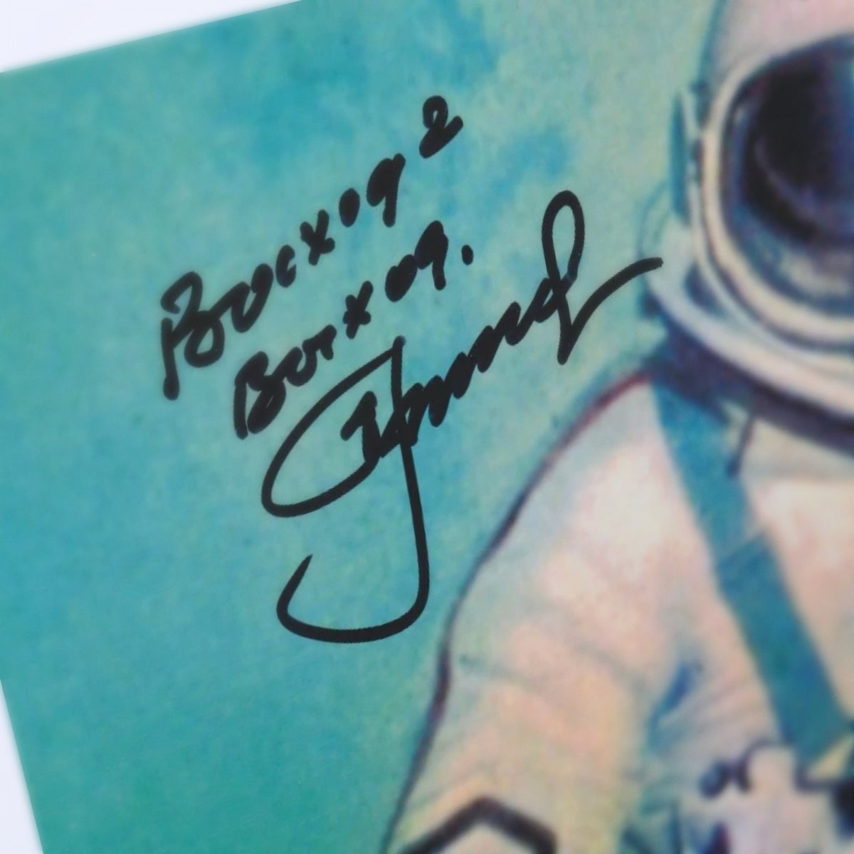 Close-up of Alexei Leonov's signature and Voskhod 2 inscription on the photo