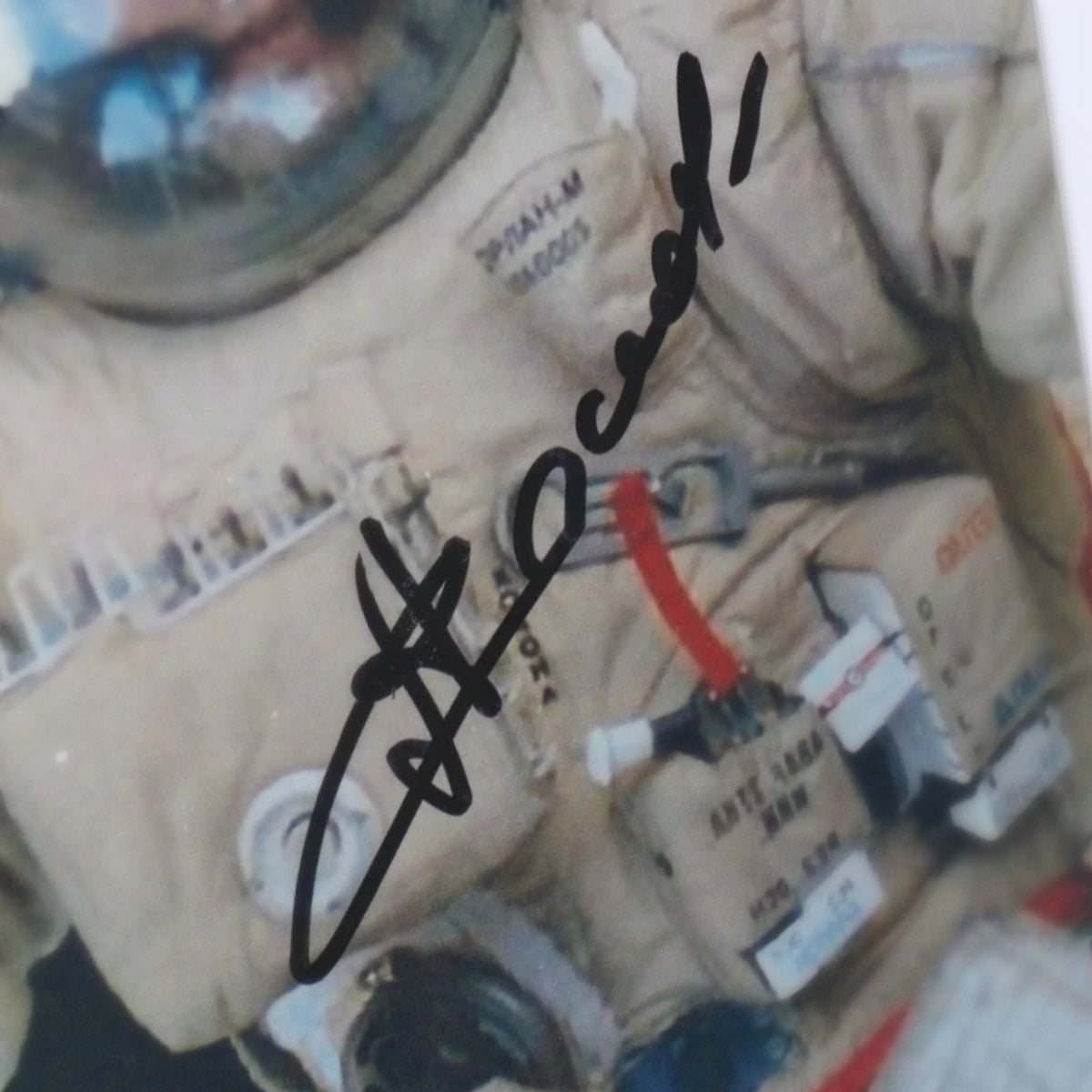 Close-up of Anatoly Solovyev's signature on the spacewalk photo