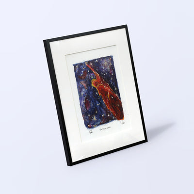 Haro-Cane watercolor print of Herbig-Haro 49/50 in a black frame with white mat, angled view