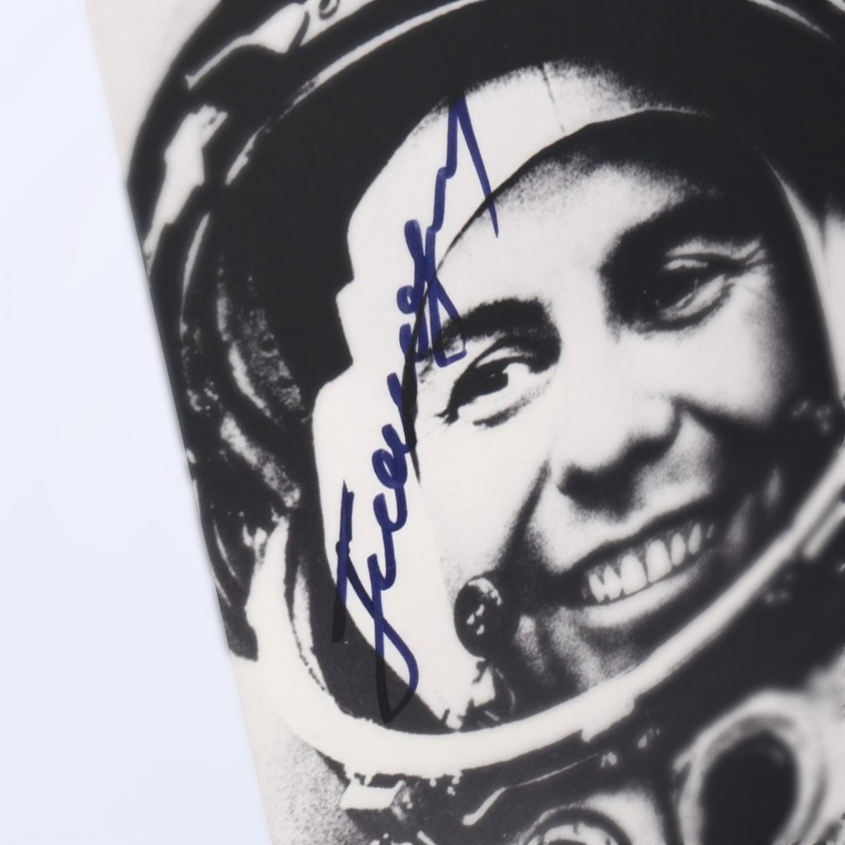 Close-up of Pavel Popovich's signature on the photo