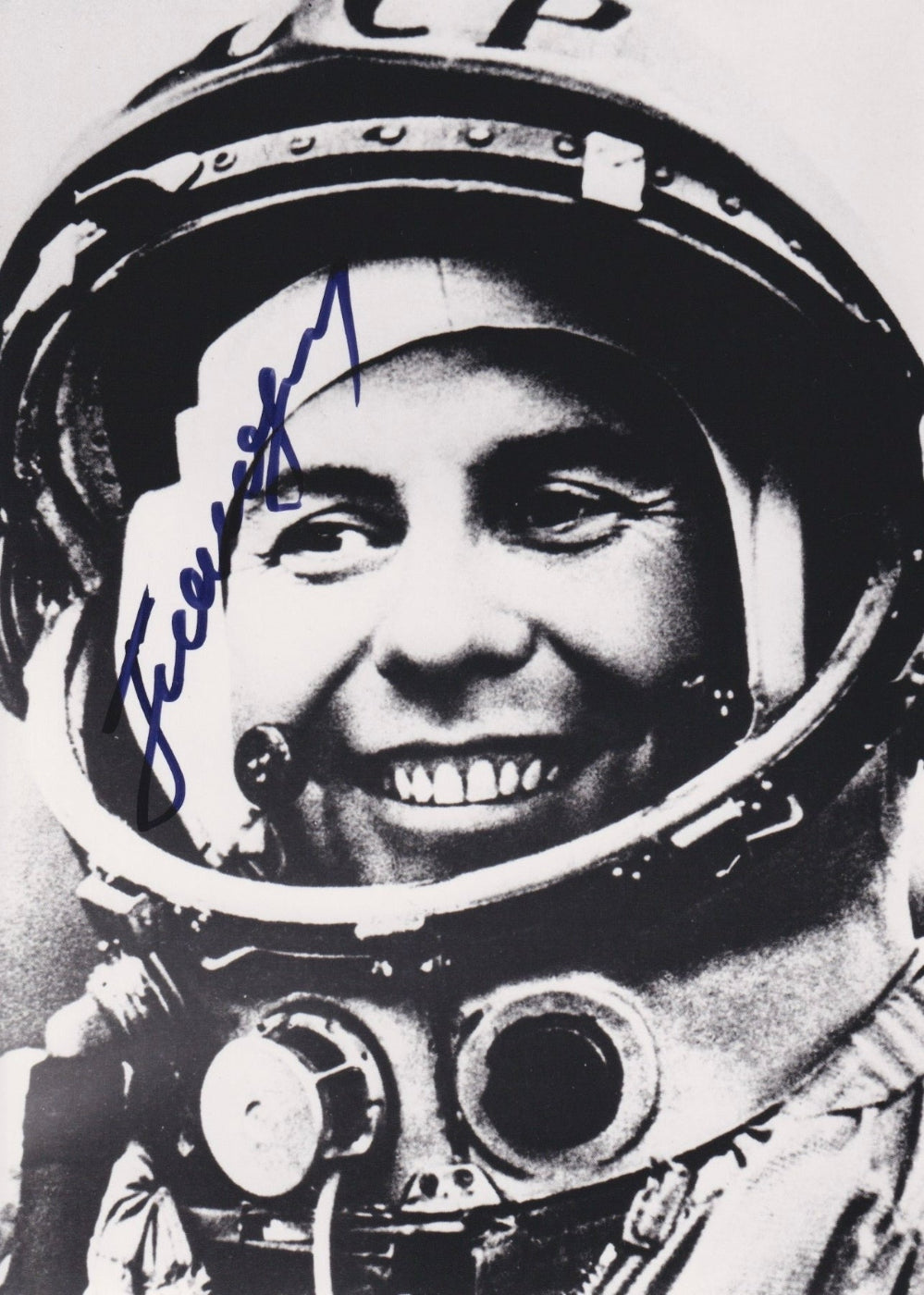 Signed portrait of cosmonaut Pavel Popovich in Sokol spacesuit with mission patch, perfect for space memorabilia collectors