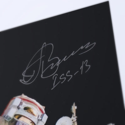 Close-up of Pavel Vinogradov's signature with the ISS-13 inscription