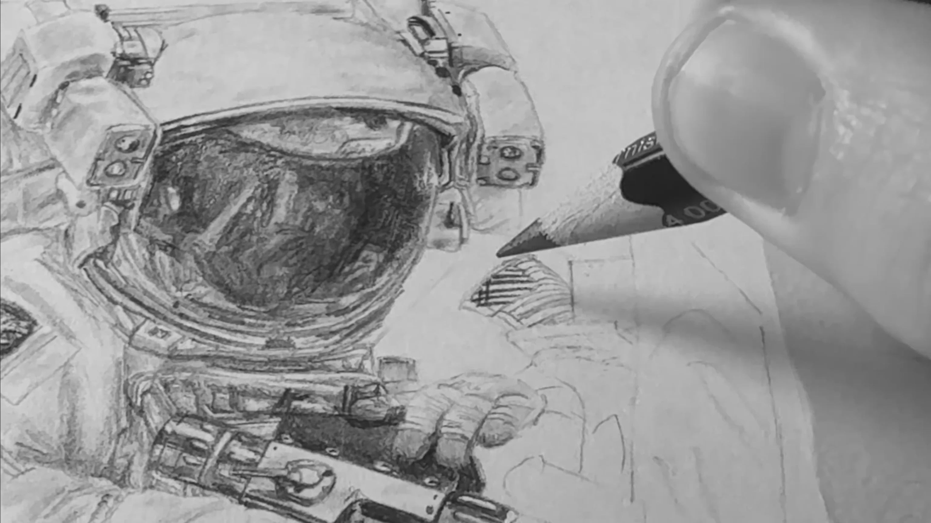 Load video: Video thumbnail showing a close-up of a pencil sketch in progress, with an astronaut suit and helmet being drawn by Art of a Space Nerd.