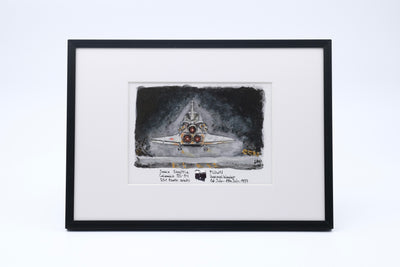 Framed watercolor of Space Shuttle Columbia landing, seen from behind, with a flown STS-94 thermal blanket fragment