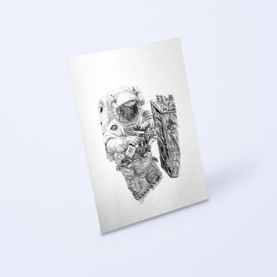 Pencil drawing of an astronaut on a spacewalk as a fine art print, shown at an angle on a light background