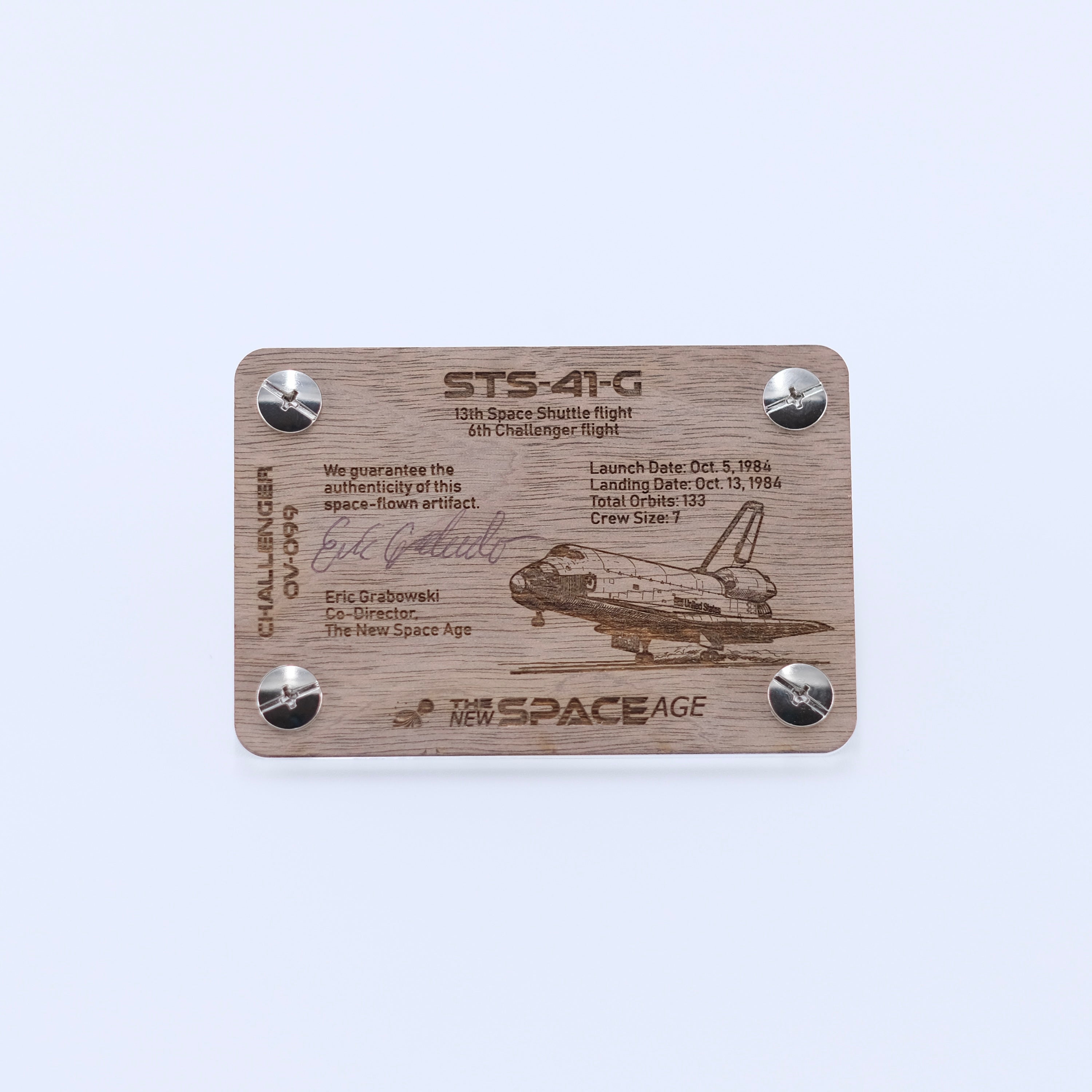 Back side of the STS-41-G Challenger flown AFRSI thermal blanket artifact display card featuring mission details, authenticity statement, and Space Shuttle Challenger engraving.