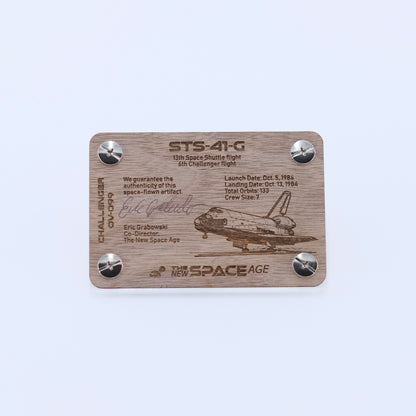 Back side of the STS-41-G Challenger flown AFRSI thermal blanket artifact display card featuring mission details, authenticity statement, and Space Shuttle Challenger engraving.