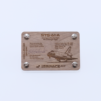Back side of the STS-61A Challenger flown space fabric artifact display card featuring mission details, authenticity statement, and Space Shuttle Challenger engraving.