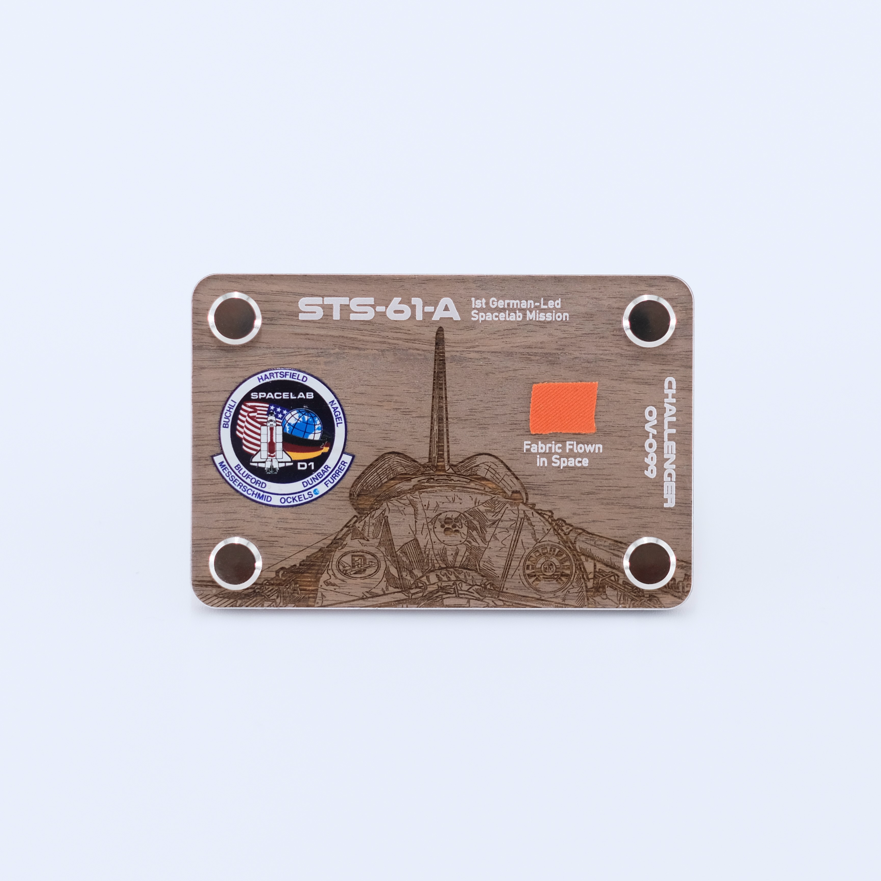 STS-61A Challenger artifact display card featuring a genuine flown space fabric fragment from the first German-led Spacelab mission aboard Space Shuttle Challenger.