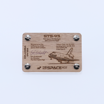 Back side of the STS-93 Columbia flown solar blanket artifact display card featuring mission details, authenticity statement, and Space Shuttle Columbia engraving.