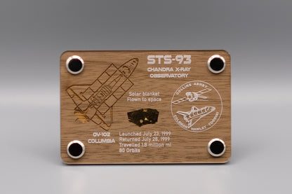 Premium wooden display with flown solar blanket fragment from Space Shuttle Columbia STS-93 mission, featuring engraved mission details and Chandra X-ray Observatory emblem.