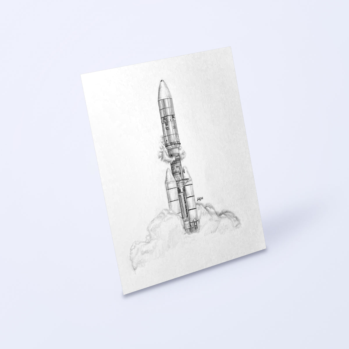 Pencil drawing of a Titan IIIE rocket launch as a fine art print, shown at an angle on a light background