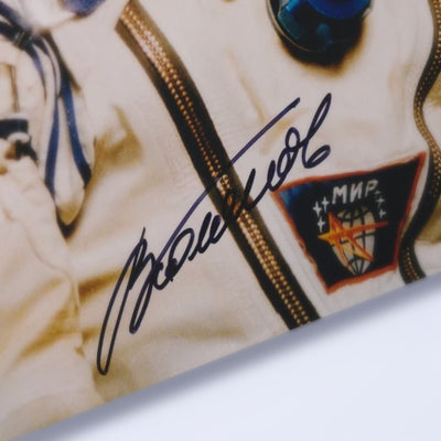 Close-up of Valery Polyakov's signature on the photo