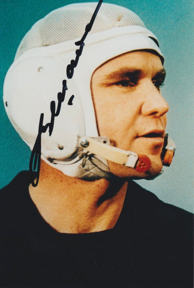 Signed portrait of cosmonaut Vladimir Shatalov wearing a white communications cap